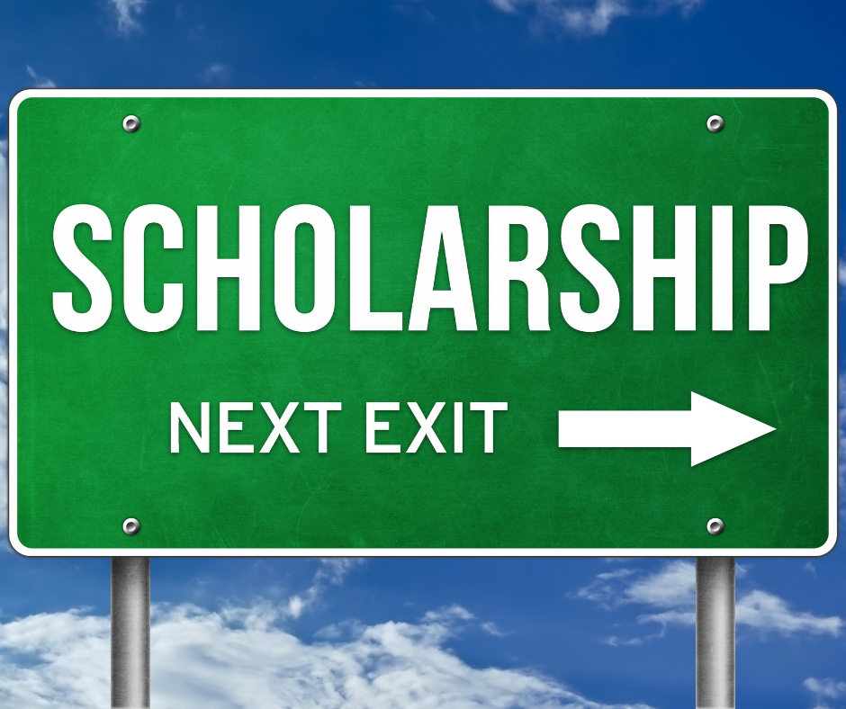 road sign that says scholarship next exit